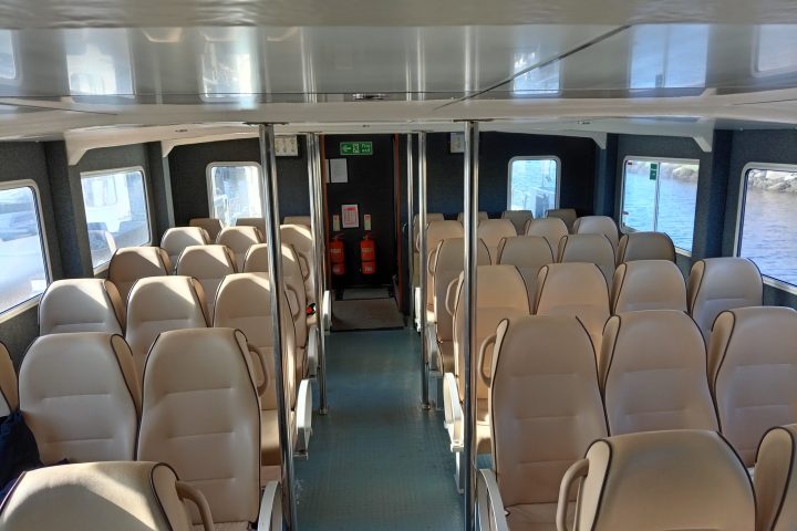 a room filled with furniture and a large window